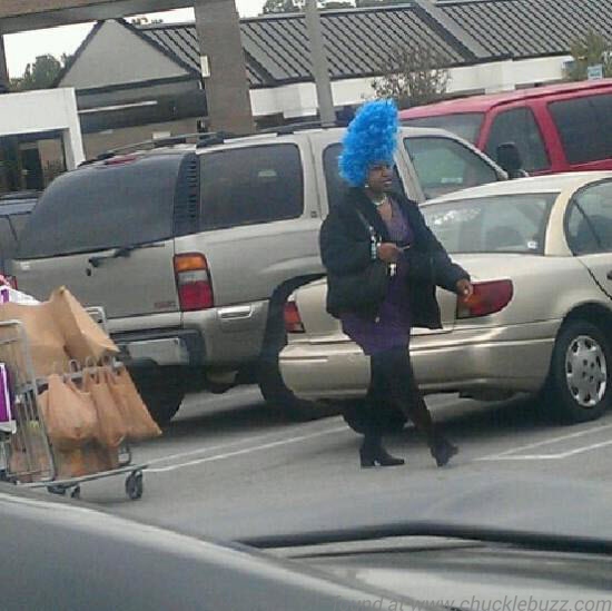 Black woman with blue hair. Interesting mix.